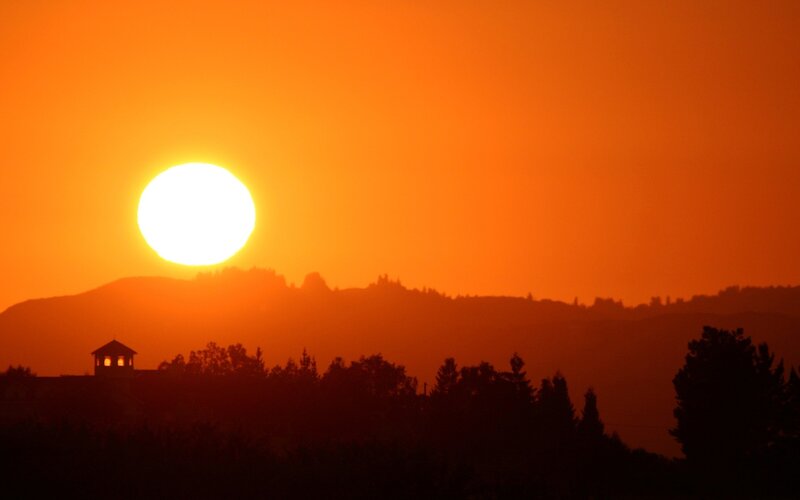 sunset over hills