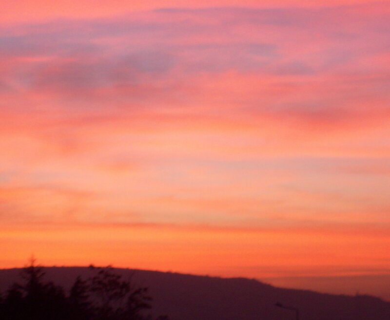 sunset over hills
