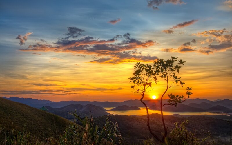 Sunset over Hills and Lake — Orange, Serene