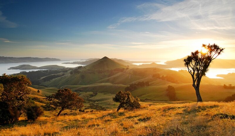 Sunset over Hills and Water