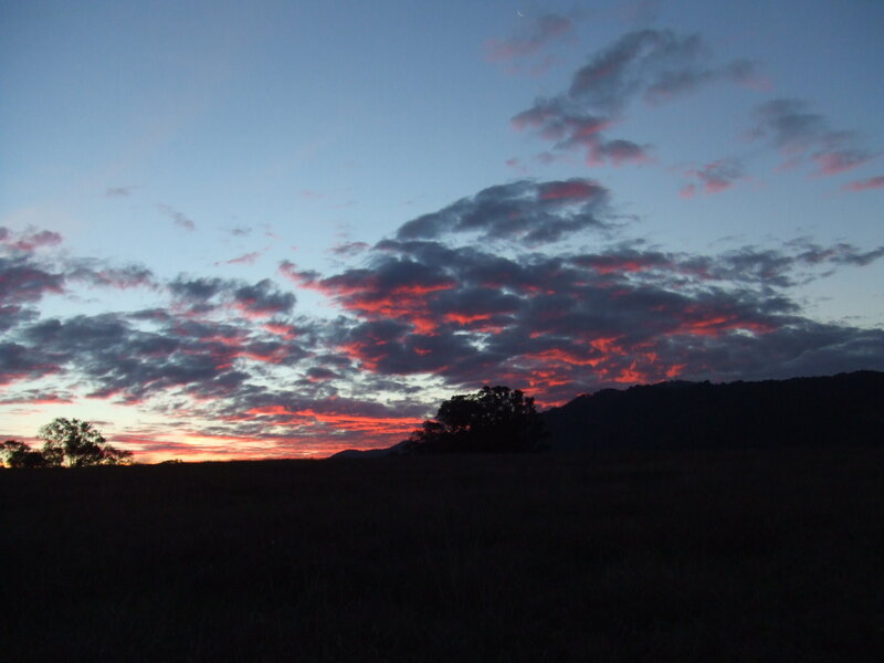 Sunset over Hills — Blue, Dramatic, Photograph, Clouds