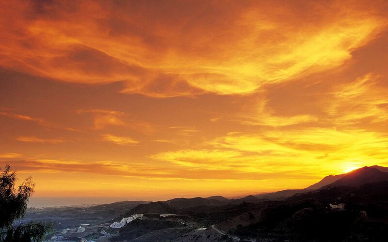 Sunset over Hills — Orange, Dramatic, Photograph, Buildings