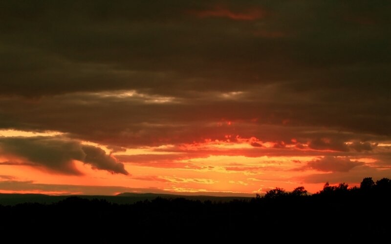 Sunset over Hills — Orange, Dramatic, Photograph, Clouds, Trees, Sky