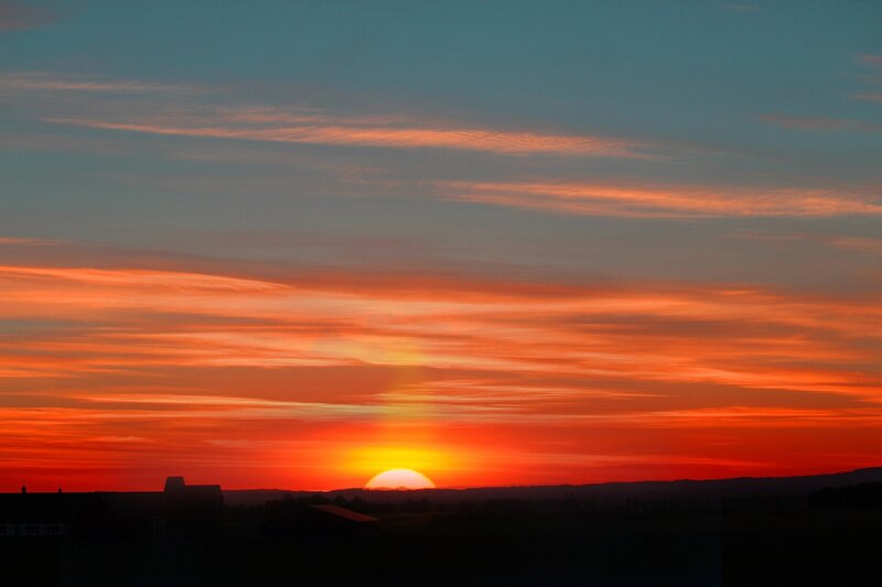 Sunset over Hills — Orange, Dramatic, Photograph, Sun, Clouds