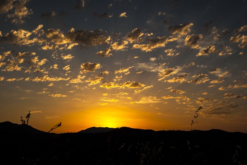 Sunset over Hills — Yellow, Dramatic, Photograph, Clouds