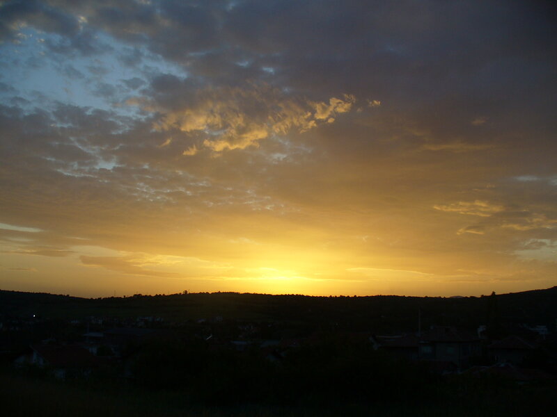 Sunset over Hills — Yellow, Dramatic, Photograph, Clouds, Town