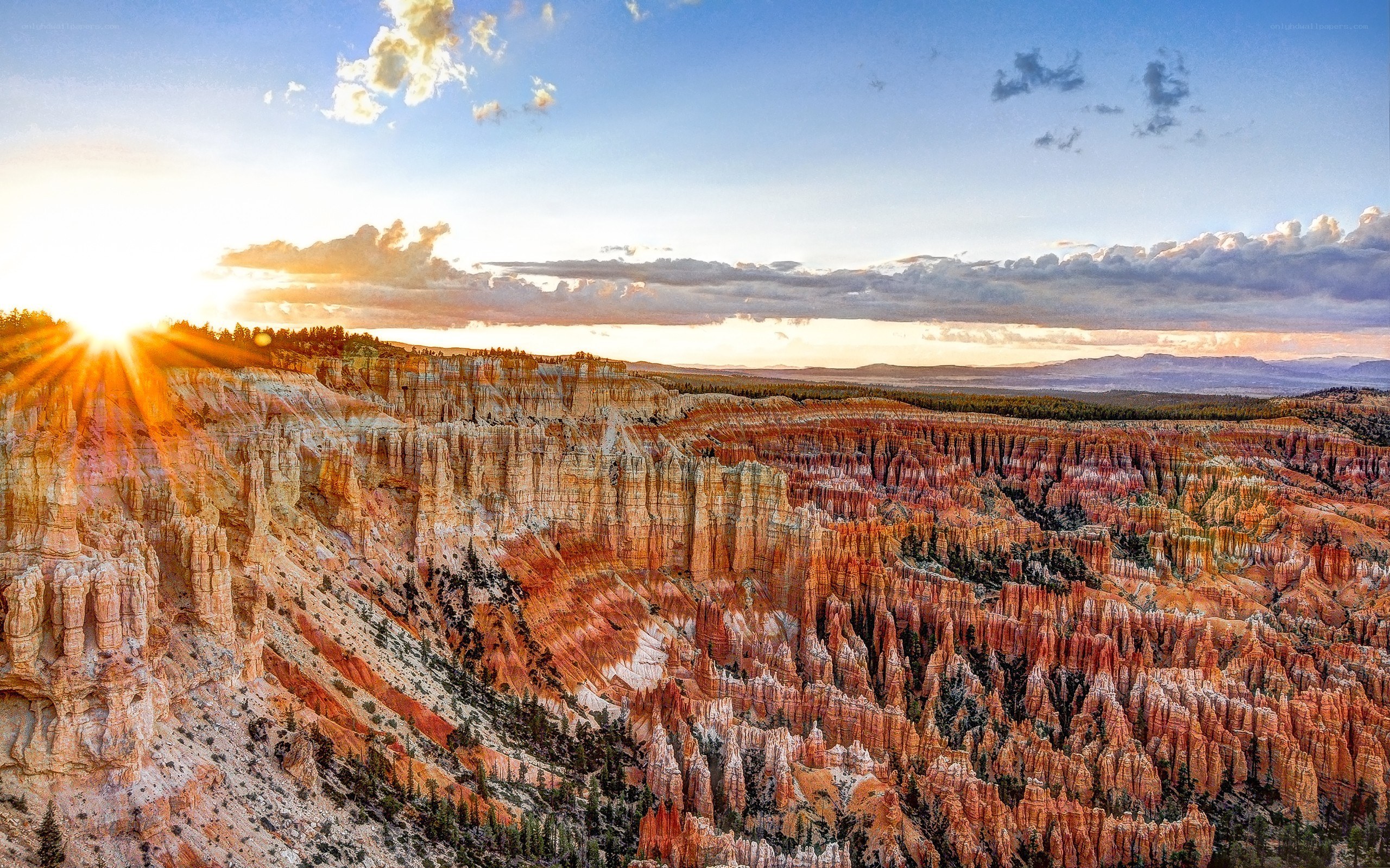 Sunset over hoodoos canyon