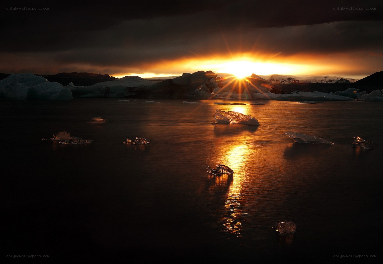 Sunset over icebergs