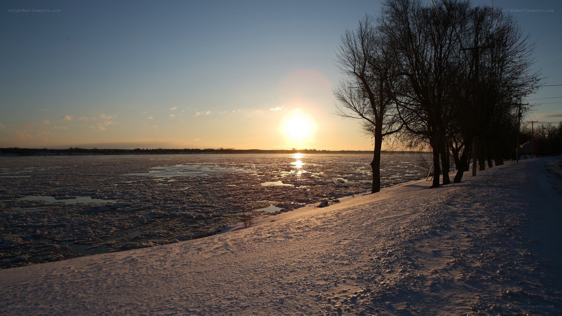 Sunset over icy river
