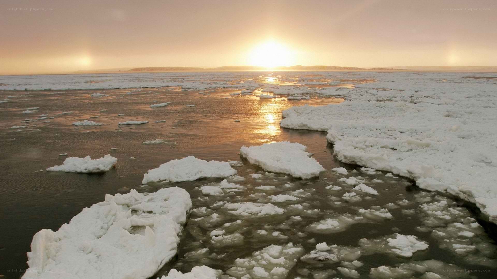 Sunset over icy sea