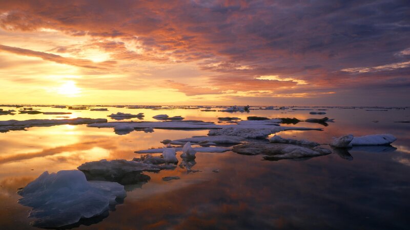 Sunset over icy waters