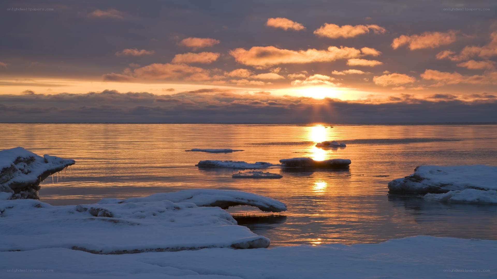 Sunset over icy waters