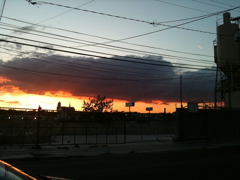 sunset over industrial area