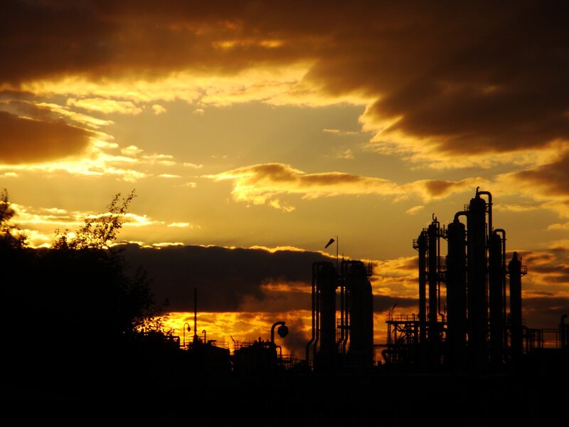 Sunset over industrial plant