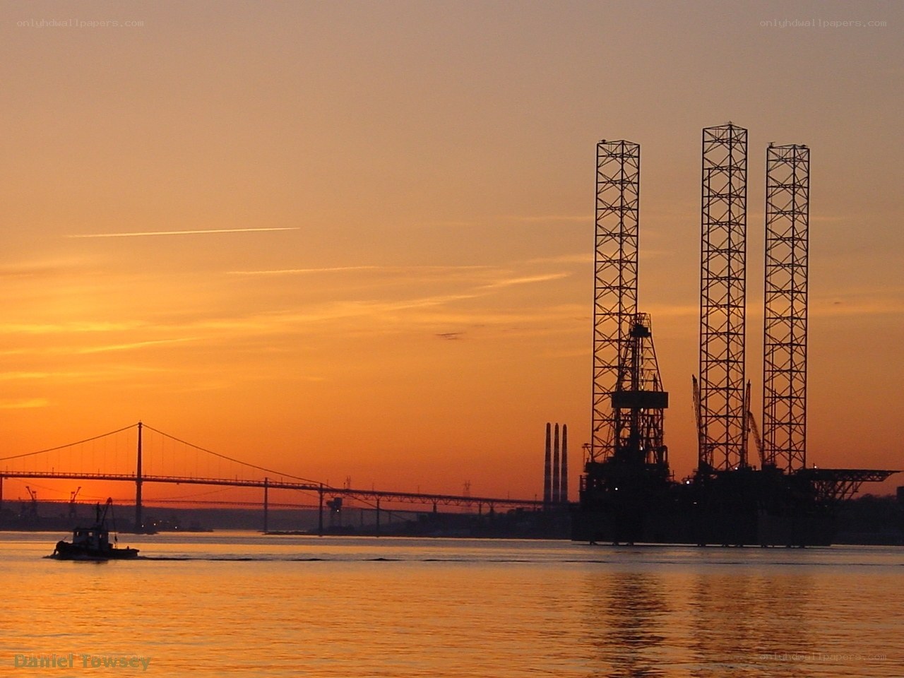 Sunset over industrial port