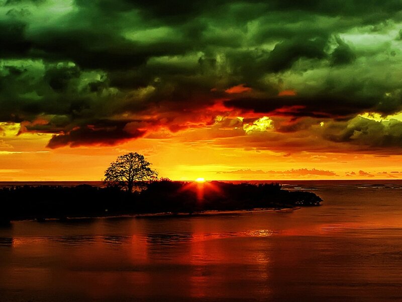 Sunset over Island — Orange, Dramatic