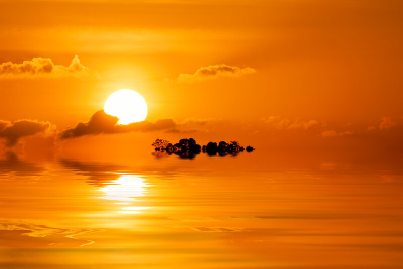Sunset over Island — Orange, Serene, Photograph, Sun