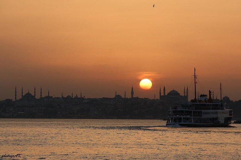 Sunset over Istanbul with ferry