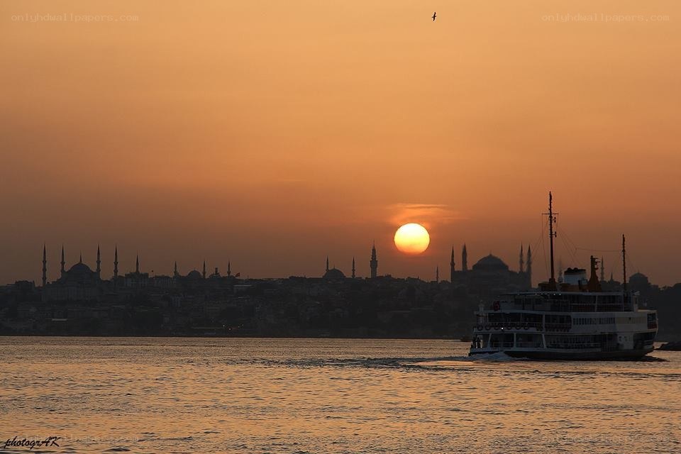 Sunset over Istanbul with ferry