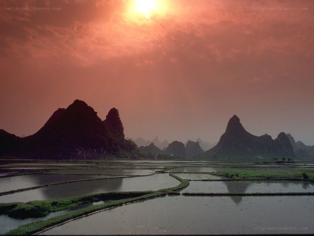 Sunset over karst landscape