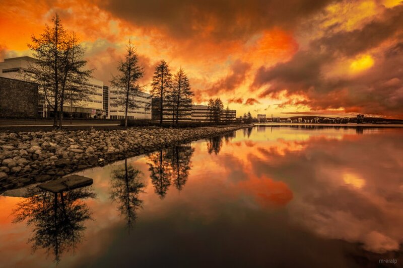 Sunset over Lake and Buildings