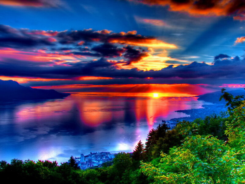 Sunset over Lake and City