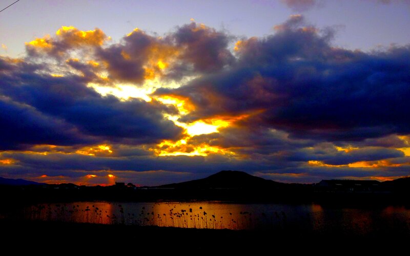 Sunset over Lake and Hill