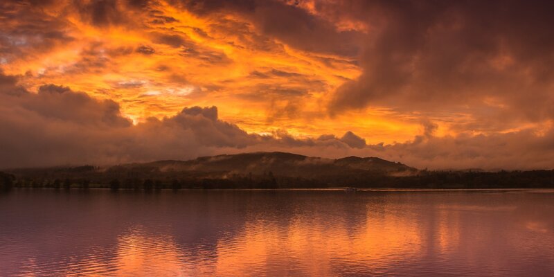 Sunset over Lake and Hills — Orange, Dramatic