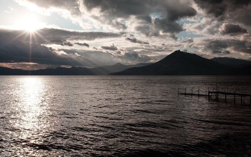 Sunset over Lake and Mountain — Gray, Dramatic