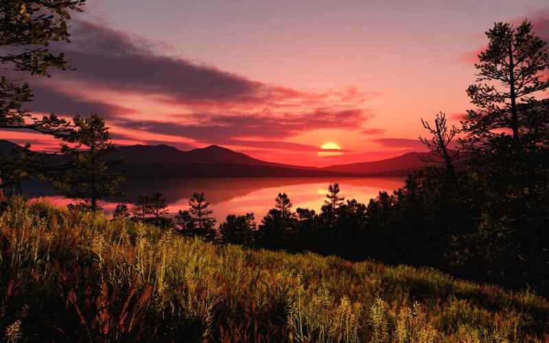 Sunset over lake and mountains