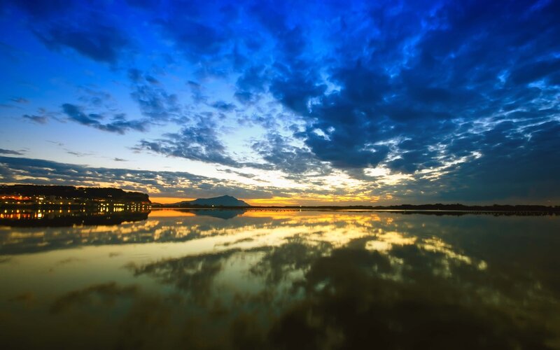 Sunset over Lake — Blue, Dramatic, Photograph, Clouds, Mountain, City Lights