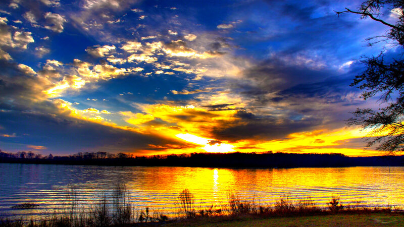 Sunset over Lake — Blue, Dramatic, Photograph, Clouds, Trees, Water, Yellow