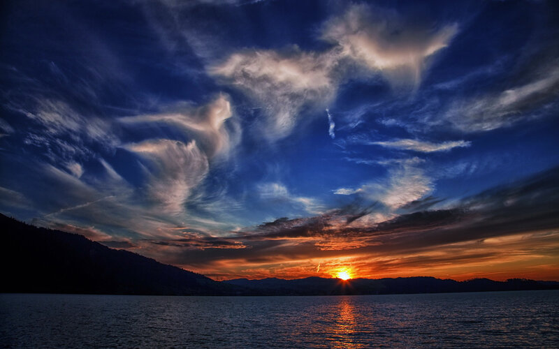 Sunset over Lake — Blue, Dramatic, Photograph, Mountains, Clouds, Sun