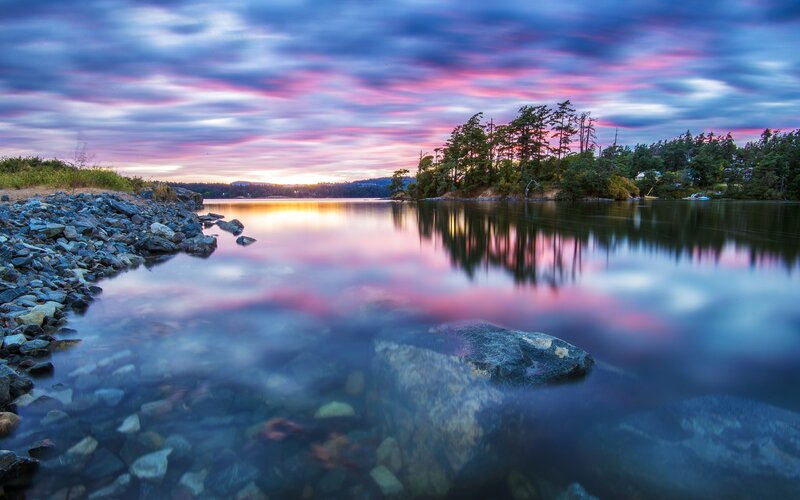 Sunset over Lake — Blue, Serene, Photograph, Rocks, Trees, Sky