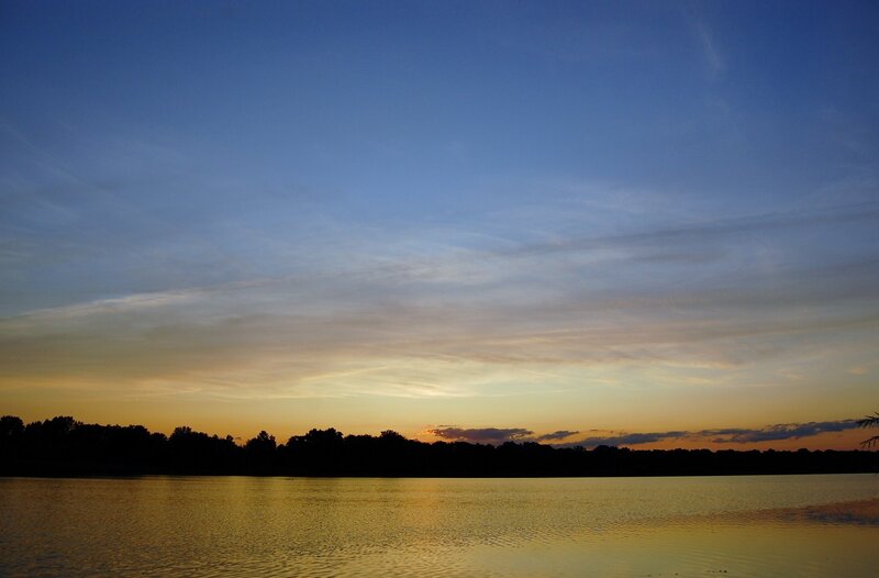 Sunset over Lake — Blue, Serene, Photograph, Sky, Trees, Water, Yellow