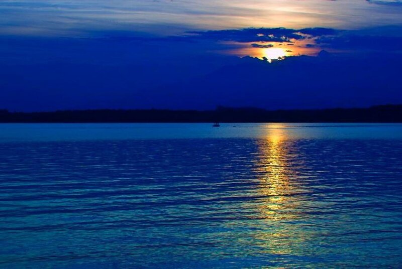 Sunset over Lake — Blue, Serene, Photograph, Sun, Boat, Clouds