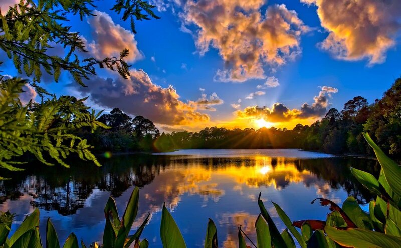 Sunset over Lake — Blue, Serene, Photograph, Trees, Clouds, Sun, Reflection