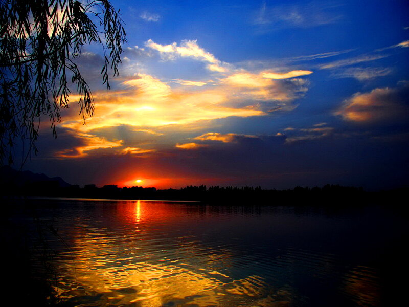 Sunset over Lake — Blue, Serene, Photograph, Trees, Clouds, Sun