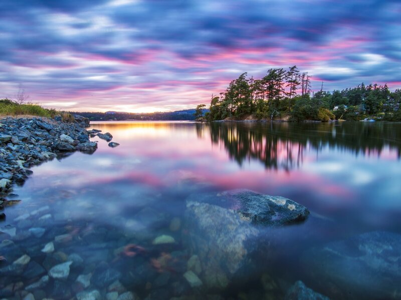 Sunset over Lake — Blue, Serene, Photograph, Trees, Rocks, Sky