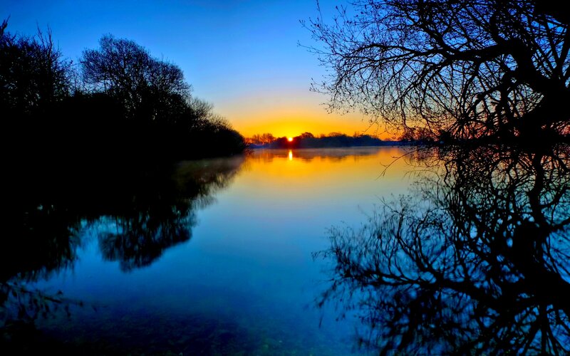 Sunset over Lake — Blue, Serene, Photograph, Trees, Sun