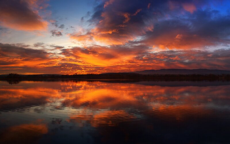 Sunset over Lake — Orange, Dramatic, Photograph, Clouds, Mountains, Reflection