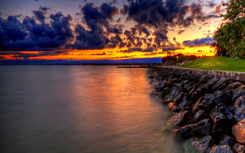Sunset over Lake — Orange, Dramatic, Photograph, Clouds, Rocks