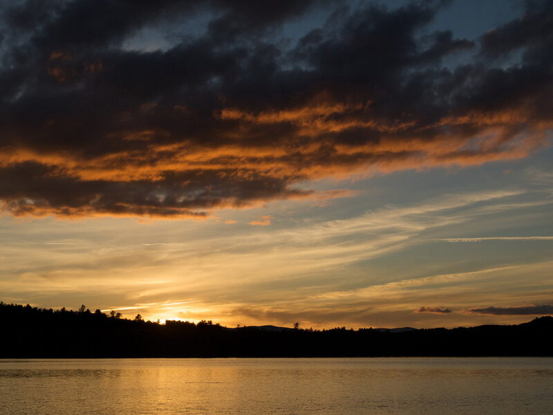 Sunset over Lake — Orange, Dramatic, Photograph, Clouds, Trees, Mountains