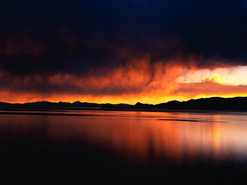 Sunset over Lake — Orange, Dramatic, Photograph, Mountains, Clouds, Reflection, Black