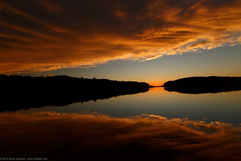 Sunset over Lake — Orange, Dramatic, Photograph, Sky, Clouds, Trees, Black