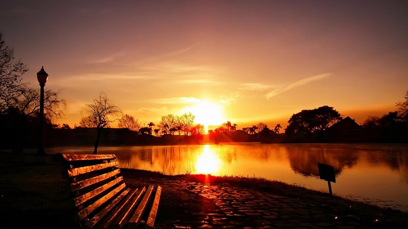 Sunset over Lake — Orange, Serene, Photograph, Bench, Lamp Post