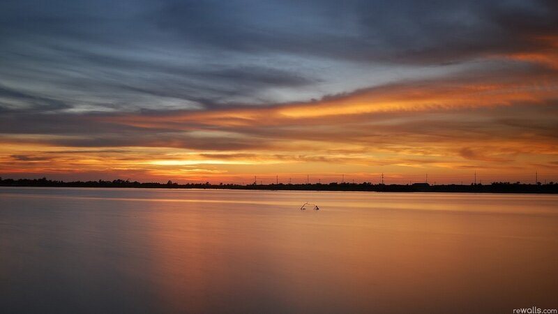 Sunset over Lake — Orange, Serene, Photograph, Clouds, Silhouette