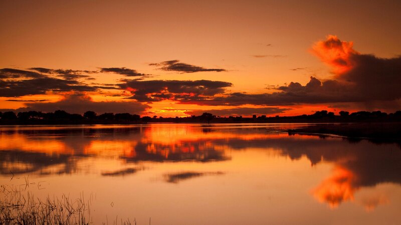 Sunset over Lake — Orange, Serene, Photograph, Clouds, Trees, Reflection, Red