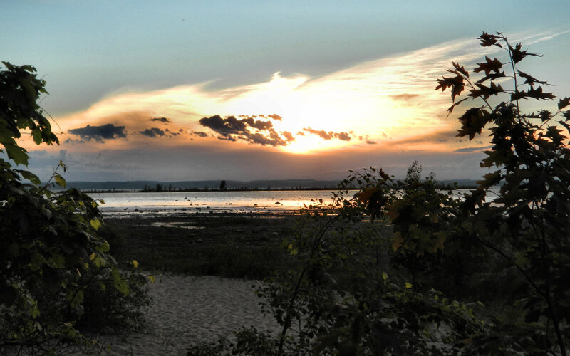Sunset over Lake — Orange, Serene, Photograph, Clouds, Trees, Sand
