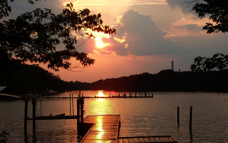 Sunset over Lake — Orange, Serene, Photograph, Dock, Trees, Chimney